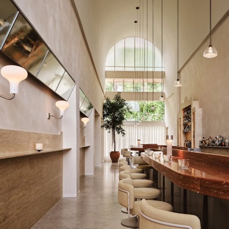 Luxury Restaurant Bar with Arched Ceilings and Red Marble Counter | Restaurant Interior Design in Dubai